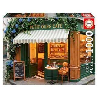 Puzzle box showing Petit Ours Café storefront with striped awning, ivy, and a teddy bear at a small outdoor table; Educa 1000-piece puzzle label.