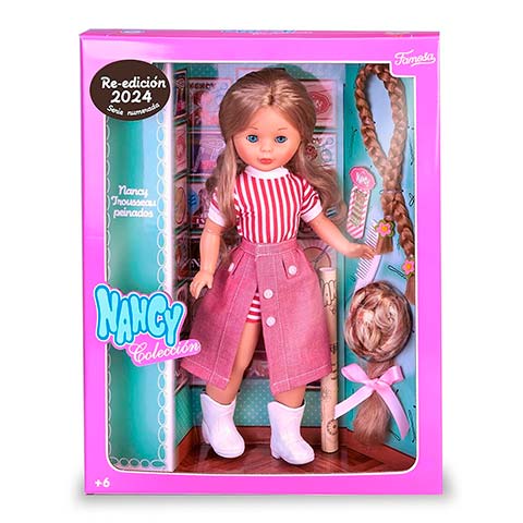 Pink Nancy Colección fashion doll in a windowed box, wearing a red-and-white striped top and pink skirt with braids, plus accessories visible inside the package.