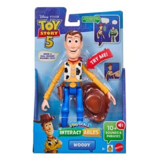 Woody action figure in blue packaging with Toy Story 5 branding and a prominent 'Try Me' badge