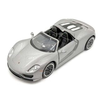 Scale model of a silver convertible sports car with open top and detailed wheels, viewed from the front-left.