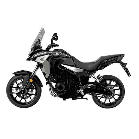 Side view of a black sport motorcycle with a windshield and angular fairings on a white background
