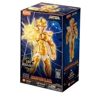 Product box for Saint Seiya Leo Aiolia Champion Class action figure in gold armor, packaging shows the character with a sunburst effect.