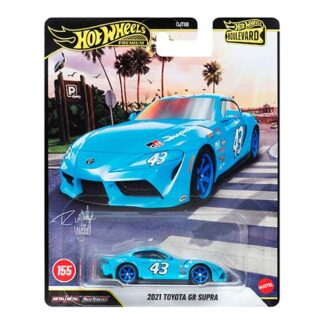 Blue Hot Wheels toy car, 2021 Toyota GR Supra, #43, on the packaging with a smaller model image and tropical background.