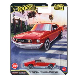 Hot Wheels Premium packaging showing a red 1967 custom Mustang die-cast car on a boulevard backdrop, plus a small red convertible image and scale marker.