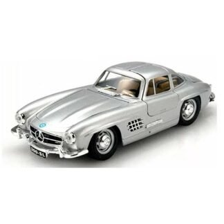 Silver die-cast miniature Mercedes-Benz 300SL toy car on a white background, viewed from the front-right side.