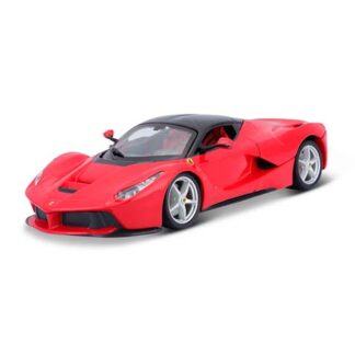 Red toy sports car with black roof and silver wheels on a white background, shown from a front-left angle