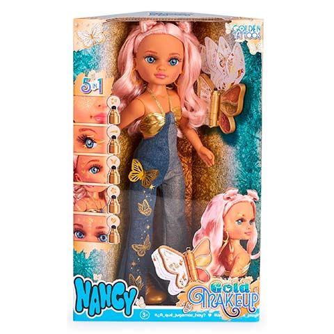 Fashion doll with pink hair in a blue dress inside butterfly-themed boxed packaging