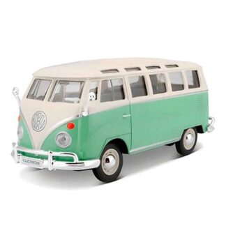 Vintage mint green and cream Volkswagen minibus toy model with white roof.