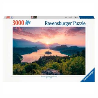 Ravensburger 3000-piece puzzle box showing a sunset over a lake and mountains; brand name visible on the packaging.